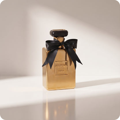 Florero de perfume dorado