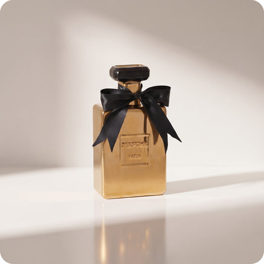 Florero de perfume dorado