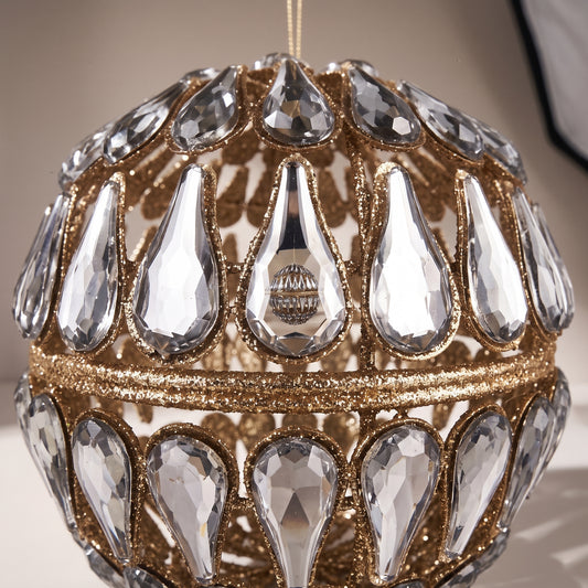 Esfera dorada con piedras espejo