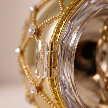 Esfera tipo huevo de apertura de cristal oro brillante con cuentas y diamantes de oro