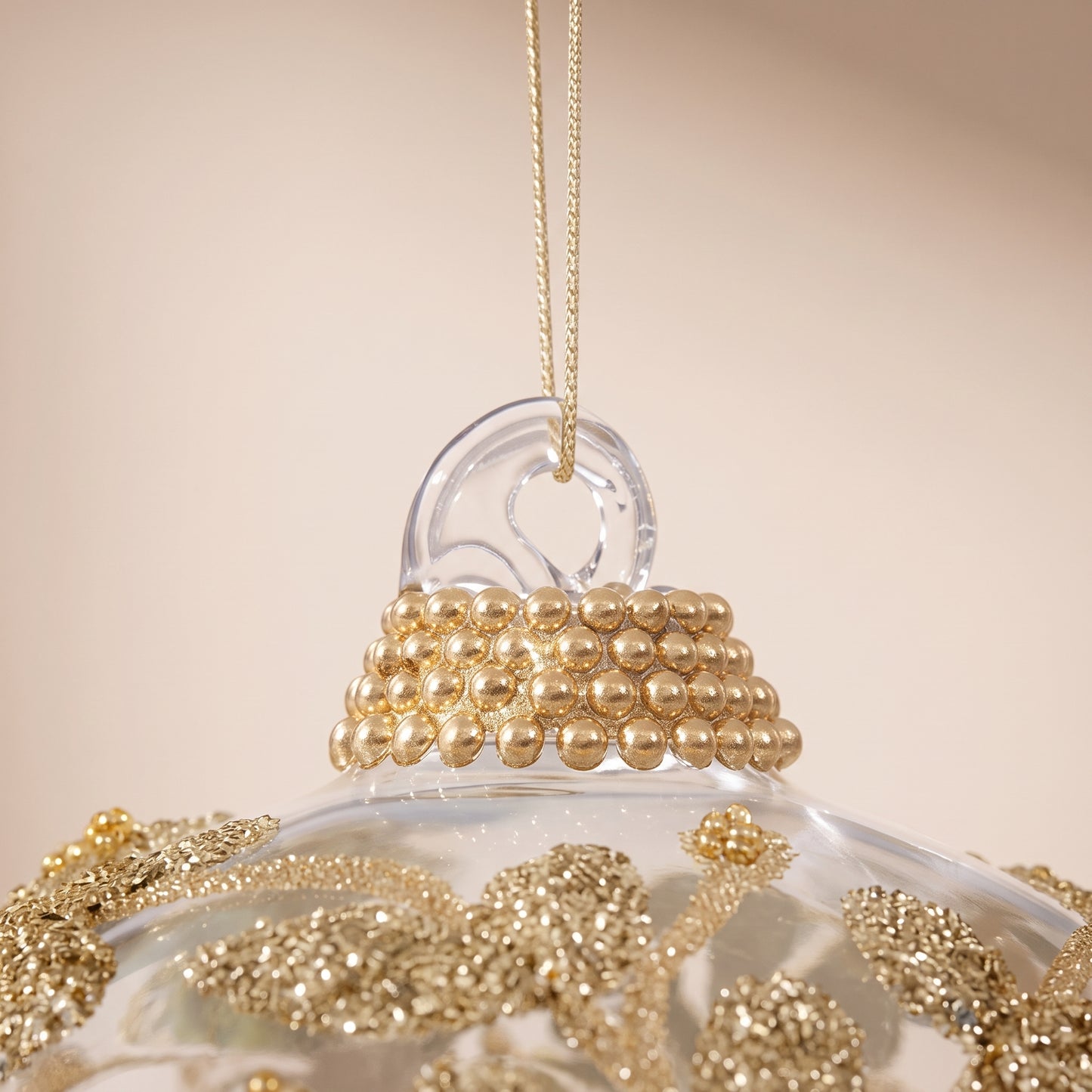 Esfera de cristal con encaje de flores de cuentas doradas transparentes