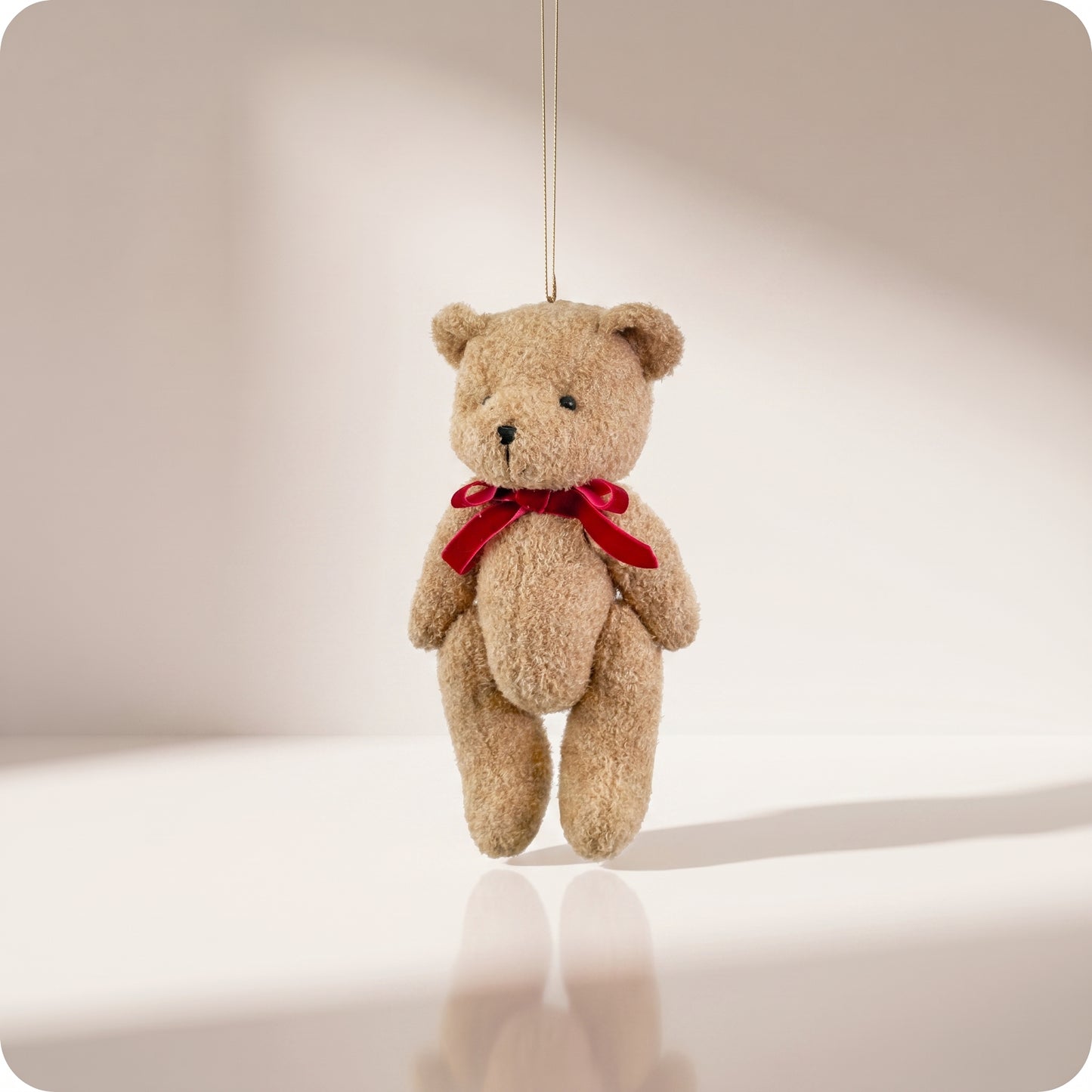 Teddy bear marrón con lazo rojo grande