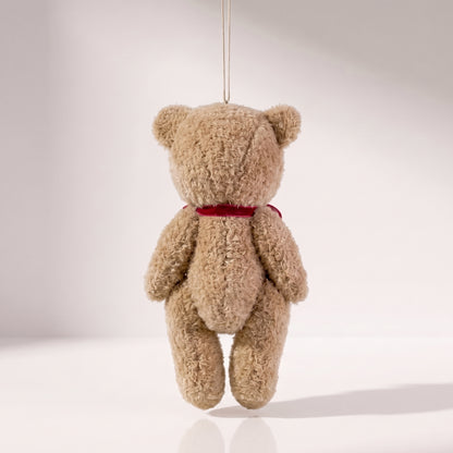 Teddy bear marrón con lazo rojo grande