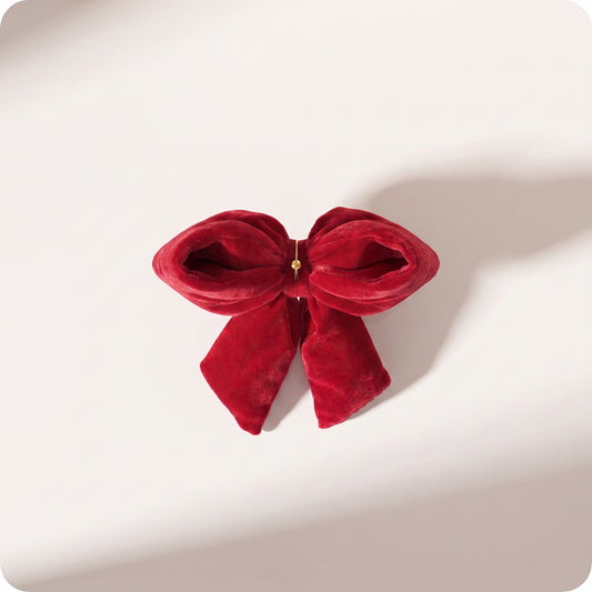 Moño de terciopelo rojo con relleno