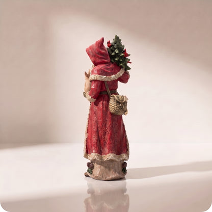 Santa de resina con árbol de navidad