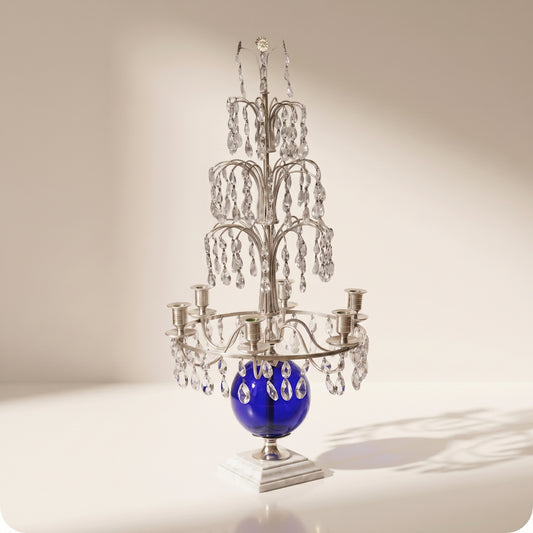 Candelabro chapado en níquel con esfera de cristal azul plateado