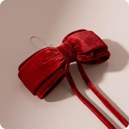 Moño rojo, 40 x 20 cm.