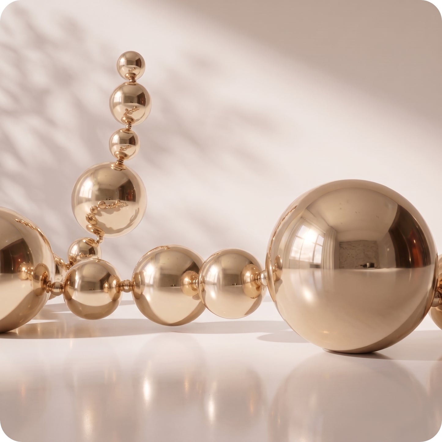 Guirnalda navideña de patron esfera grande y pequeñas champagne brillante