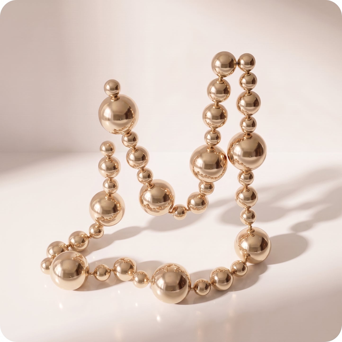 Guirnalda navideña de patron esfera grande y pequeñas champagne brillante