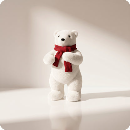 Elegante oso polar blanco con bufanda roja parado
