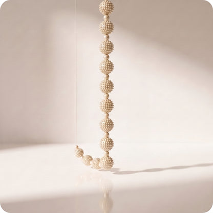 Guia de perlas con texturas elegantes