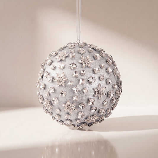 Esfera de piedras brillantes y flores