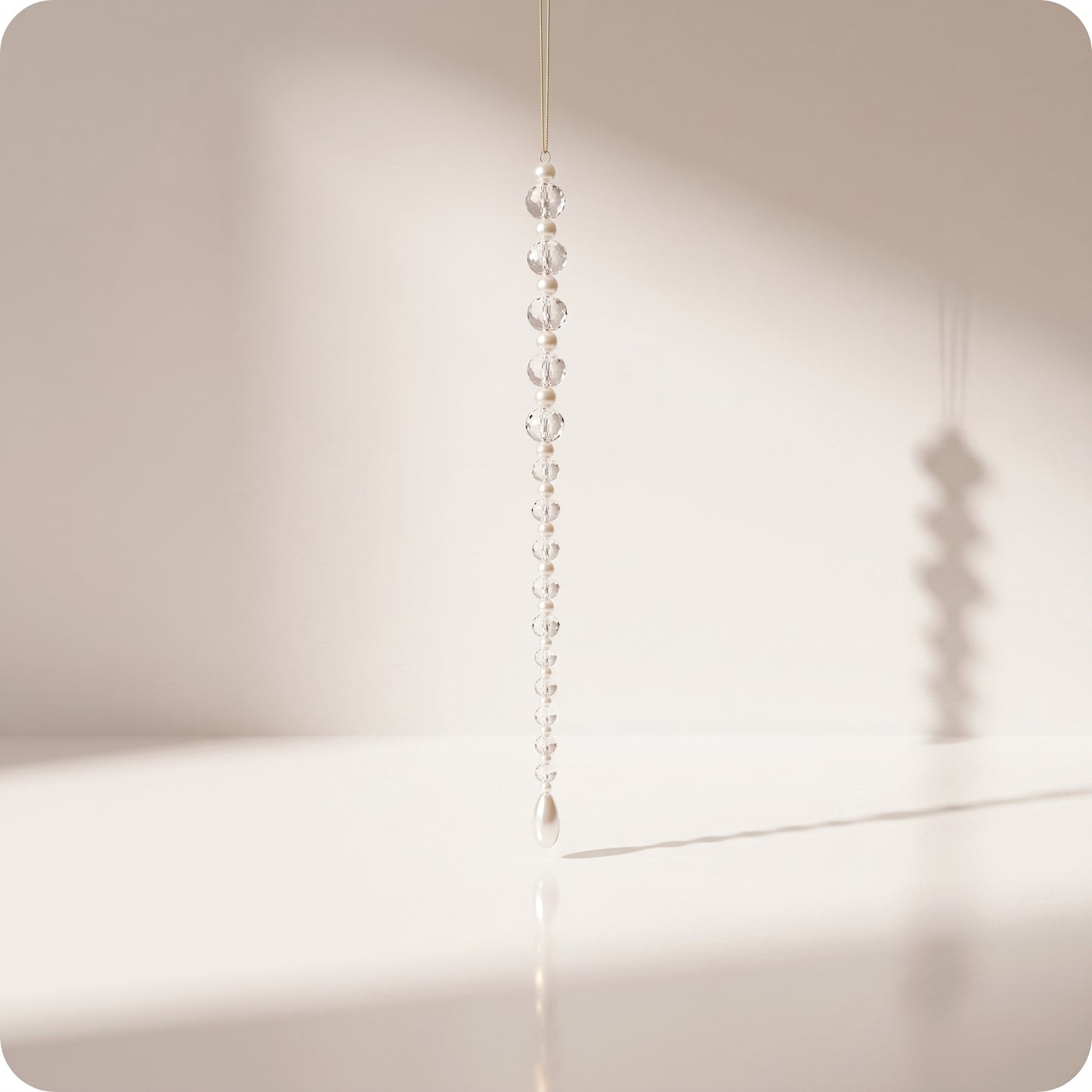 Ornamento de gota de cuentas