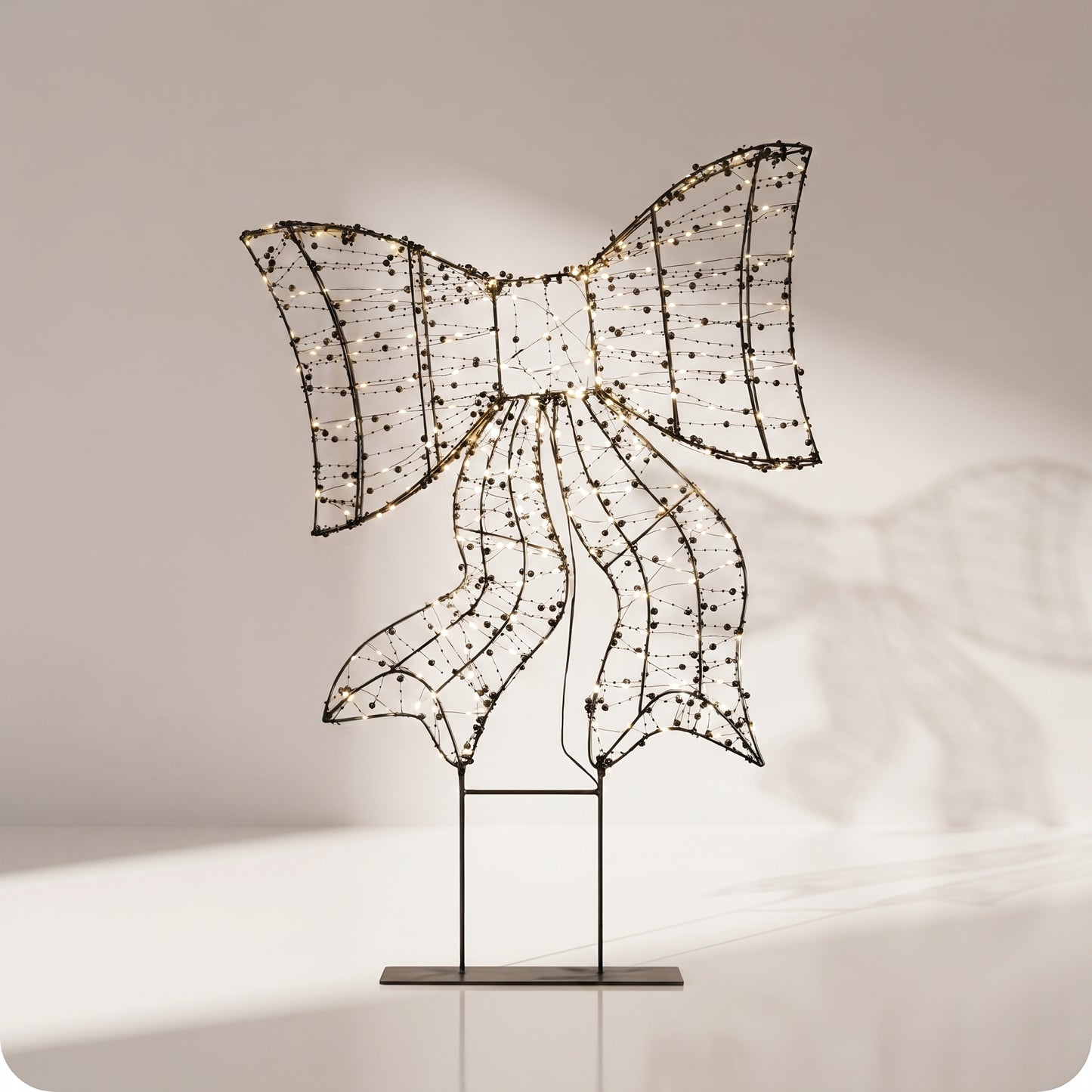 Moño de luz LED con perlas decorativas