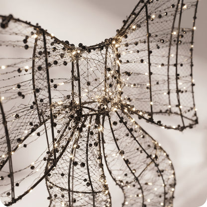 Moño de luz LED con perlas decorativas
