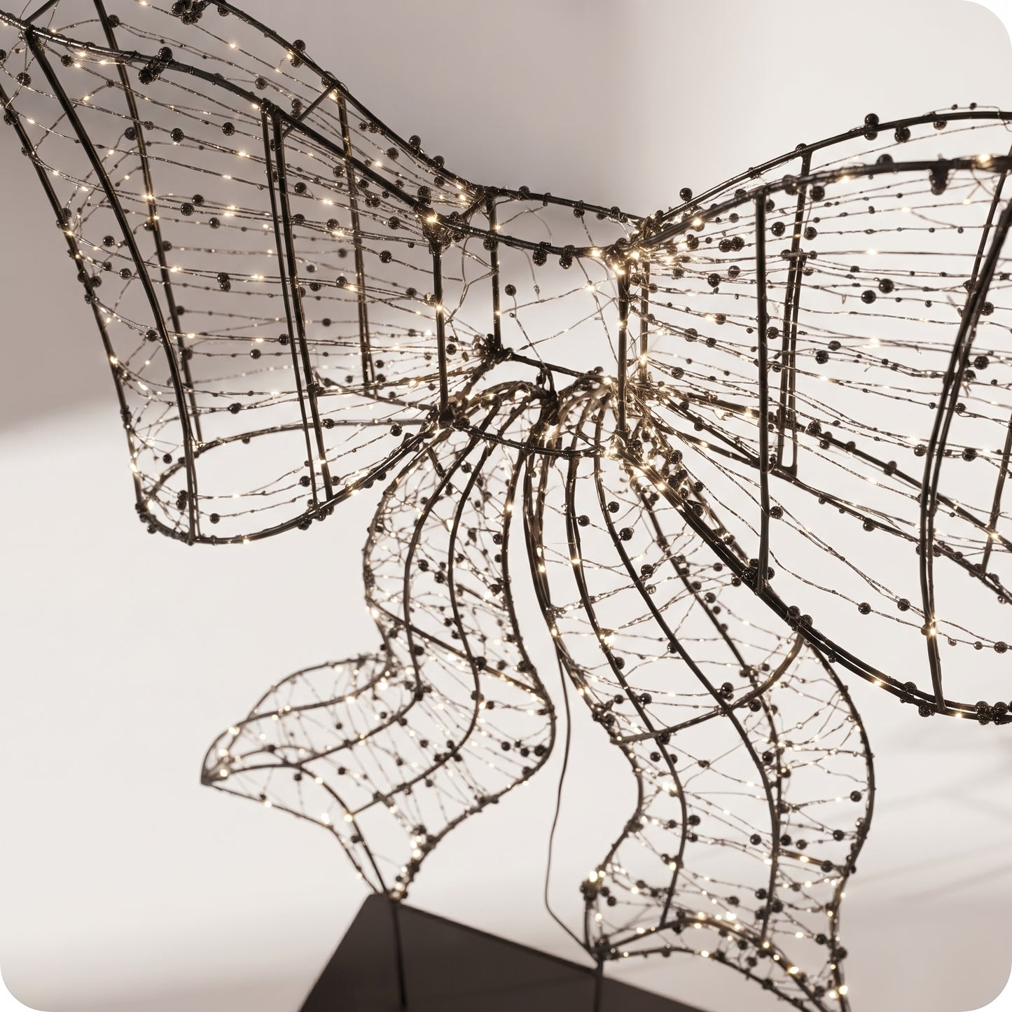 Moño de luz LED con perlas decorativas