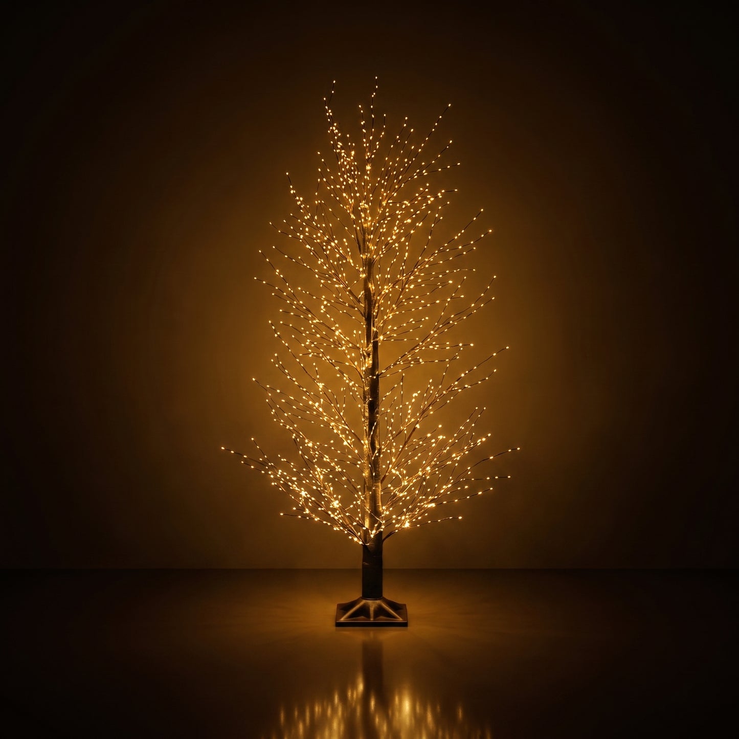 Árbol negro de micropuntos modelado de luz calida
