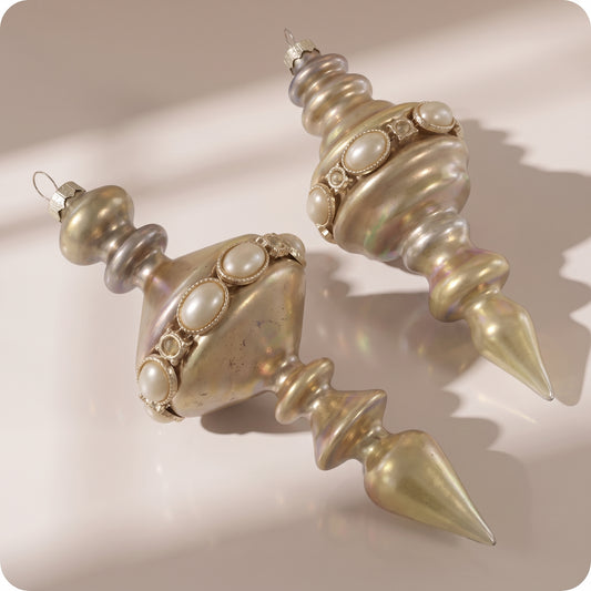 Juego de 2 adornos de relieve de cristal dorado
